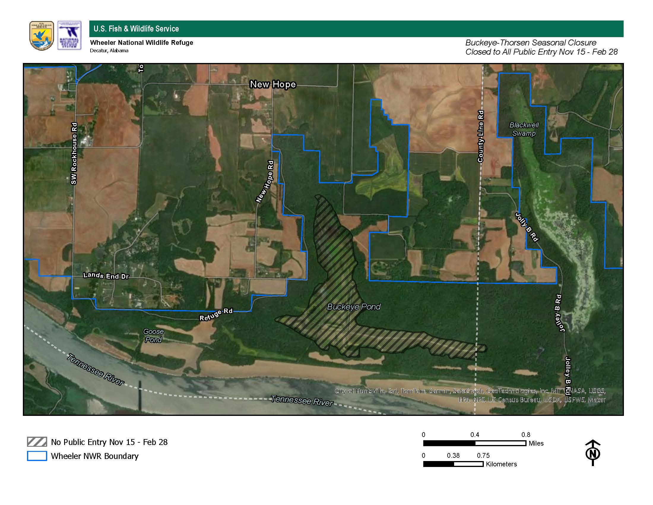 Official Wheeler map showing the hatched Buckeye–Thorsen seasonal no-entry area around Buckeye Pond, blue refuge boundary, nearby roads, north arrow and scale